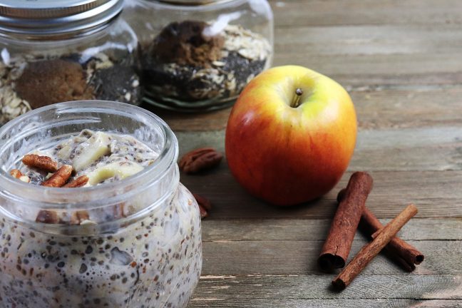 Overnight oatmeal in cute little jars for serving with apple and cinnalon.