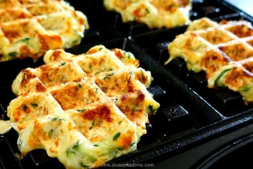 Waffle maker, meet zucchini. Together they make savory, flavorful, golden brown and lightly crisp on the outside yet tender and light on the inside fritters. And cheese, there must be cheese!