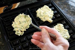 Waffle maker, meet zucchini. Together they make savory, flavorful, golden brown and lightly crisp on the outside yet tender and light on the inside fritters. And cheese, there must be cheese!