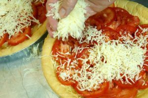 This recipe pairs rich, caramelized sweet onion with summer ripe tomatoes on top of a flakey buttery crust for a well-balanced, delectable delight. Just right for brunch, lunch or a light dinner.