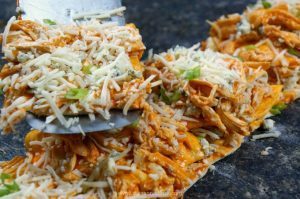 Like Buffalo Chicken? You’ll LOVE this easy, cheesy pull-apart bread. Loaded with chicken, spicy wing sauce and cheese! It’s the perfect football snack.