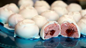 You need these bites of strawberry filling wrapped in strawberry cheesecake, dipped in white chocolate! Perfect for Valentine’s Day!