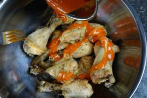 Crispy Oven Baked Chicken Legs with Buffalo and Brown Sugar Sriracha Sauces. Easy, cheap and perfect for your next party!