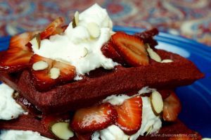 No one will guess you used shortcuts for this budget friendly, decadent treat. Red Velvet waffles with cream cheese mousse and strawberries. Perfect for Valentine’s Day breakfast, brunch or dessert.