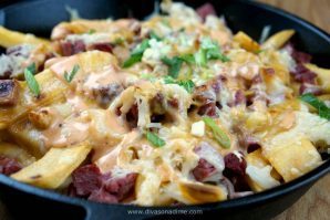 Best Bar snack EVER made easy at home! Irish Nachos with delicious Guinness Cheddar Cheese sauce to top it all! Make it next game day!