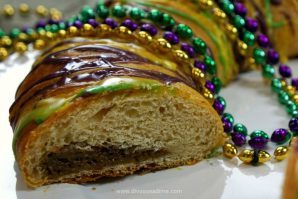 Super easy King Cake uses crescent rolls and a creamy filling made in minutes. It’s delicious! Everyone will want your recipe!