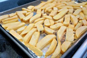Best Bar snack EVER made easy at home! Irish Nachos with delicious Guinness Cheddar Cheese sauce to top it all! Make it next game day!