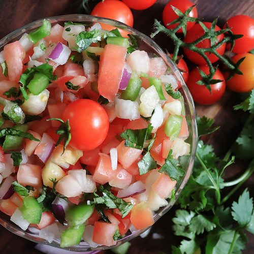 A bowl of pico de gallo. Copped tomato, onion and jalapeño peppers with lime juice and a little oil. Deliclous!