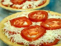 This recipe pairs rich, caramelized sweet onion with summer ripe tomatoes on top of a flakey buttery crust for a well-balanced, delectable delight. Just right for brunch, lunch or a light dinner.