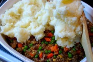 Comfort in a bowl for $1 a serving. Savory beef, the sweetness of peas and carrots topped with creamy mashed potatoes. This satisfies the tummy and soothes the soul.