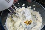 Add powdered sugar and vanilla