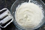 Beat whipping cream with powdered sugar